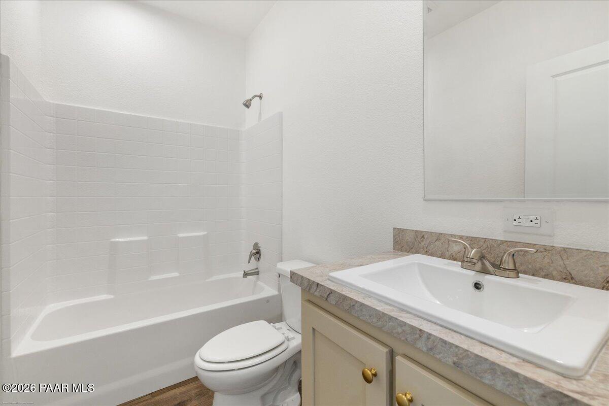 65 Hawaii Road Paulden, AZ 86334 - Photo 21 of 29 a bathroom with a sink a toilet and a bathtub