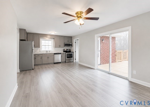 16487 Mountain Road Montpelier, VA 23192 - Photo 3 of 16 a view of a kitchen with a sink cabinets and wooden floor
