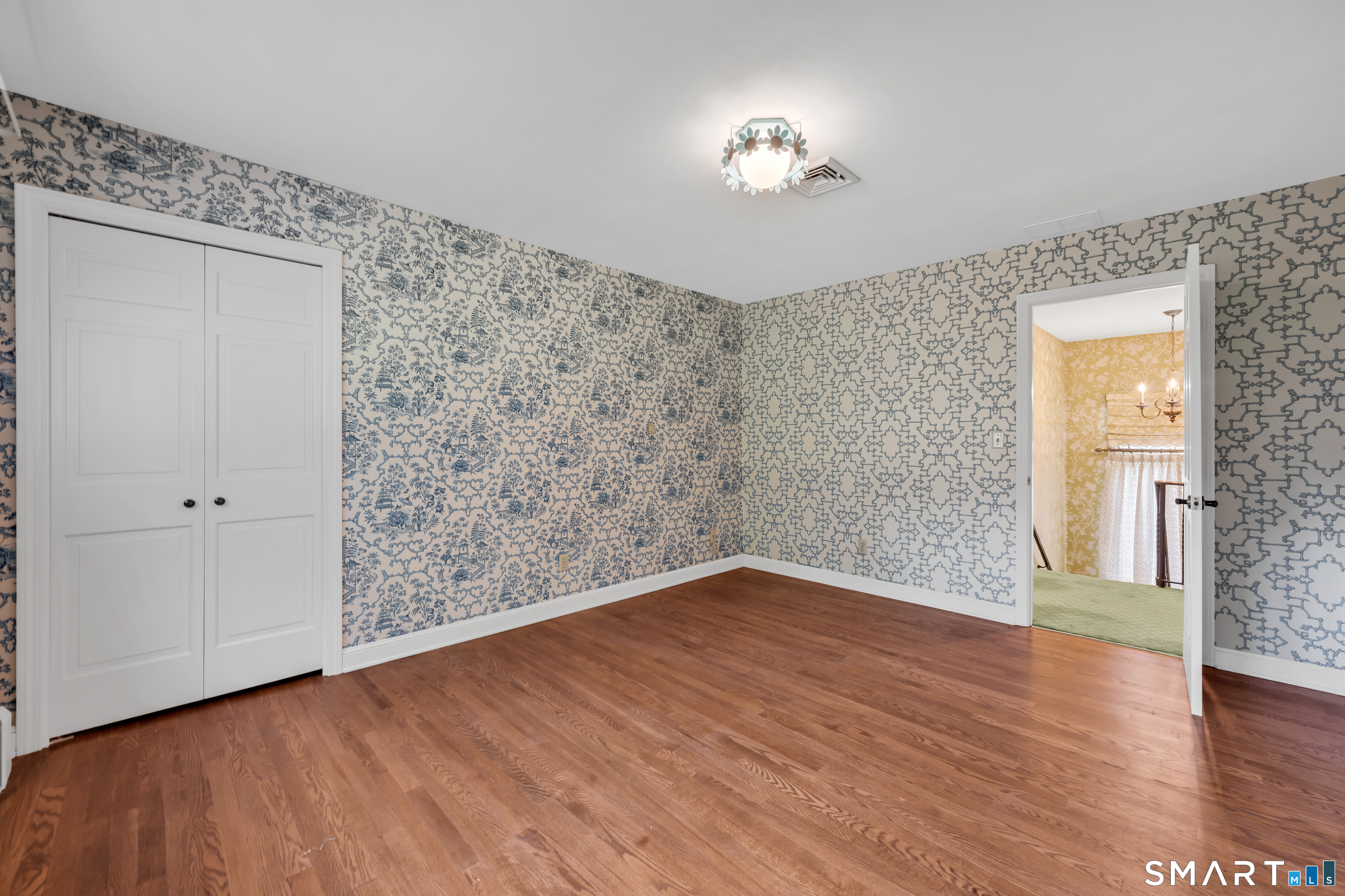 232 Maybrook Road Waterbury, CT 06708 - Photo 27 of 38 wooden floor in an empty room