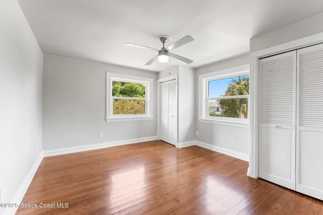 a kitchen with a sink and a stove top oven