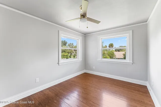 a bathroom with a toilet a sink and a mirror