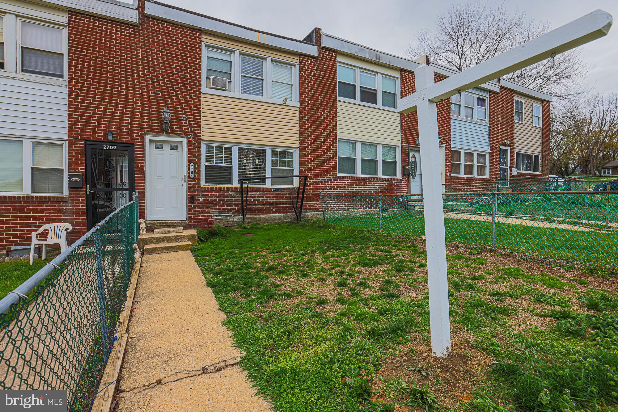 2707 Norfen Road Baltimore, MD 21227 - Photo 1 of 11 a house view with a garden space