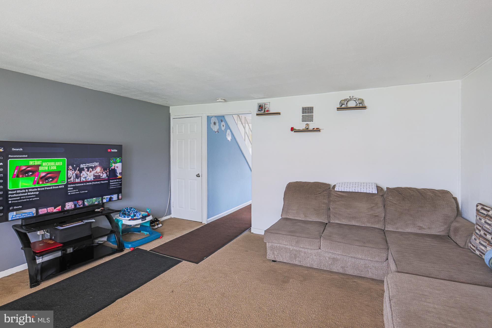 2707 Norfen Road Baltimore, MD 21227 - Photo 4 of 11 a living room with furniture and a couch