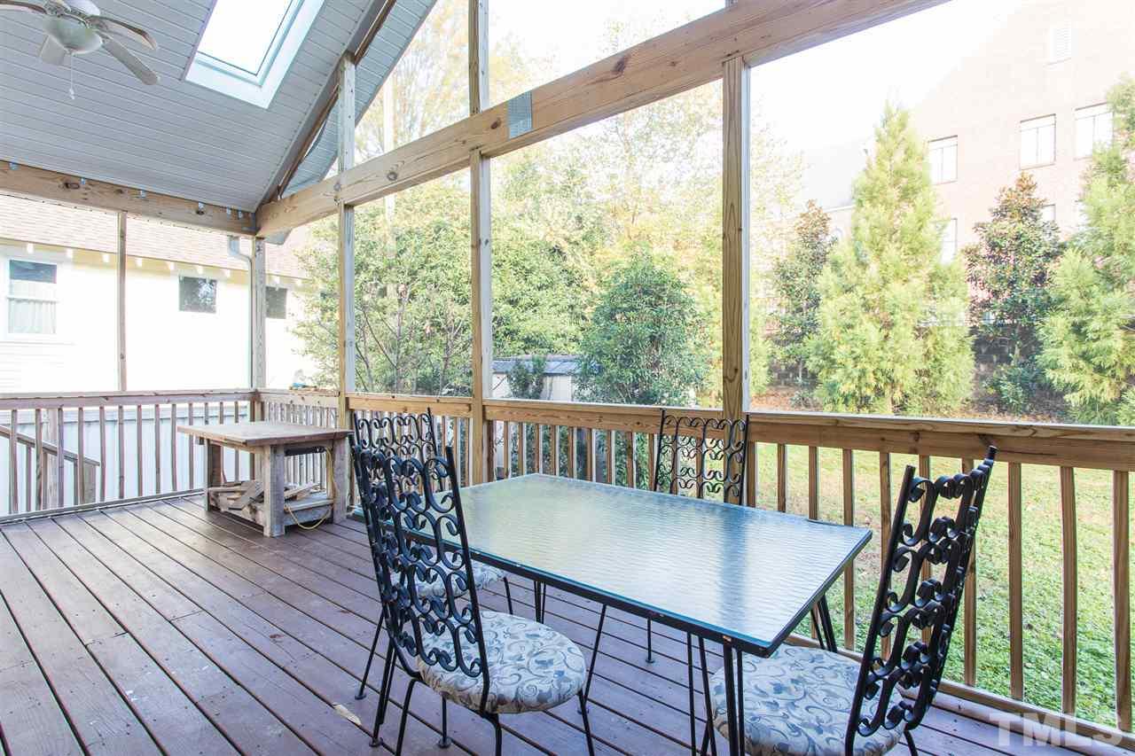 505 Holden Street Raleigh, NC 27604 - Photo 15 of 21 a view of a balcony with furniture and wooden floor