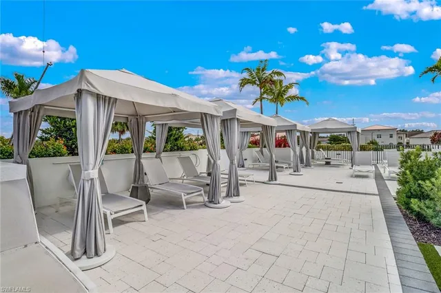 a outdoor dining space with furniture