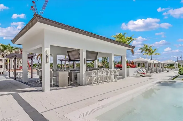 a dining hall with furniture