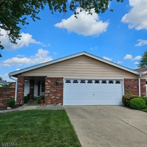 a view of a backyard of the house
