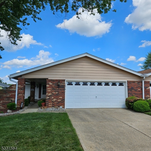 a view of a backyard of the house
