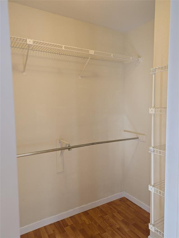 977 Riverside Drive, Unit 226 Coral Springs, FL 33071 - Photo 13 of 13 a view of a room with wooden floor