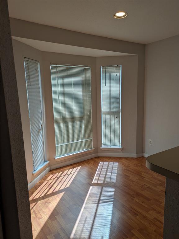 977 Riverside Drive, Unit 226 Coral Springs, FL 33071 - Photo 4 of 13 a view of a room with wooden floor and a window