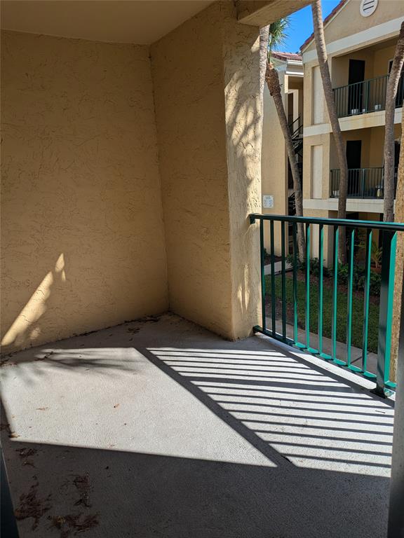 977 Riverside Drive, Unit 226 Coral Springs, FL 33071 - Photo 5 of 13 a view of a balcony with an outdoor space