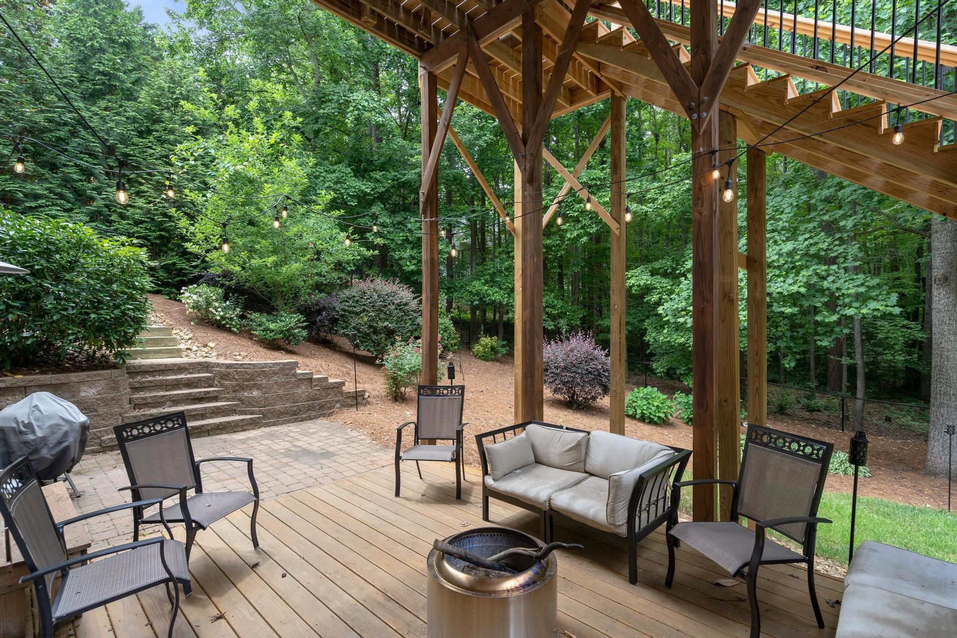 7905 Ocoee Court Raleigh, NC 27612 - Photo 42 of 55 Large Covered Patio w/Twinkle Lights
