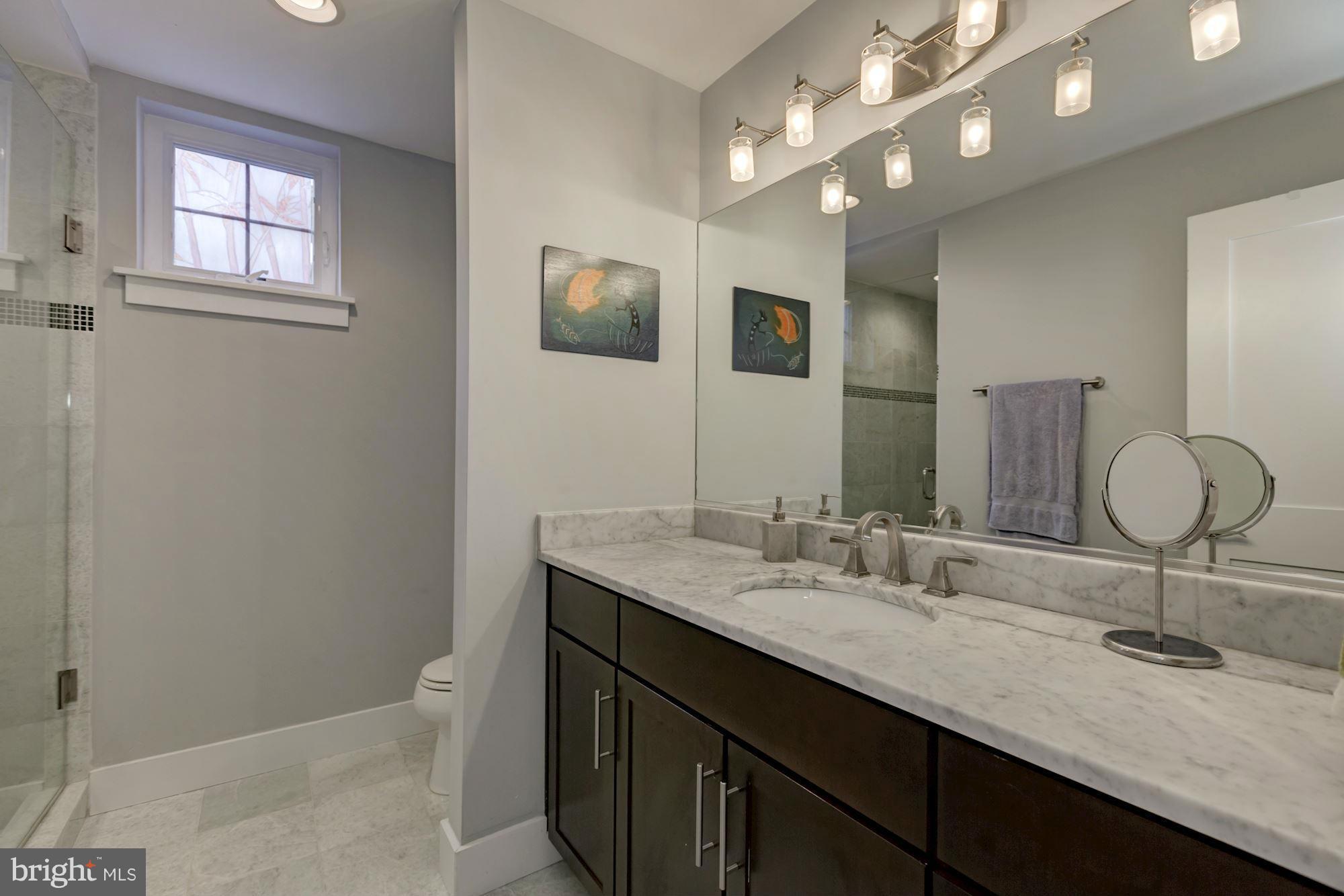 1202 Fairmont Street Northwest, Unit 2 Washington, DC 20009 - Photo 19 of 26 Stunning en-suite white marble master bath