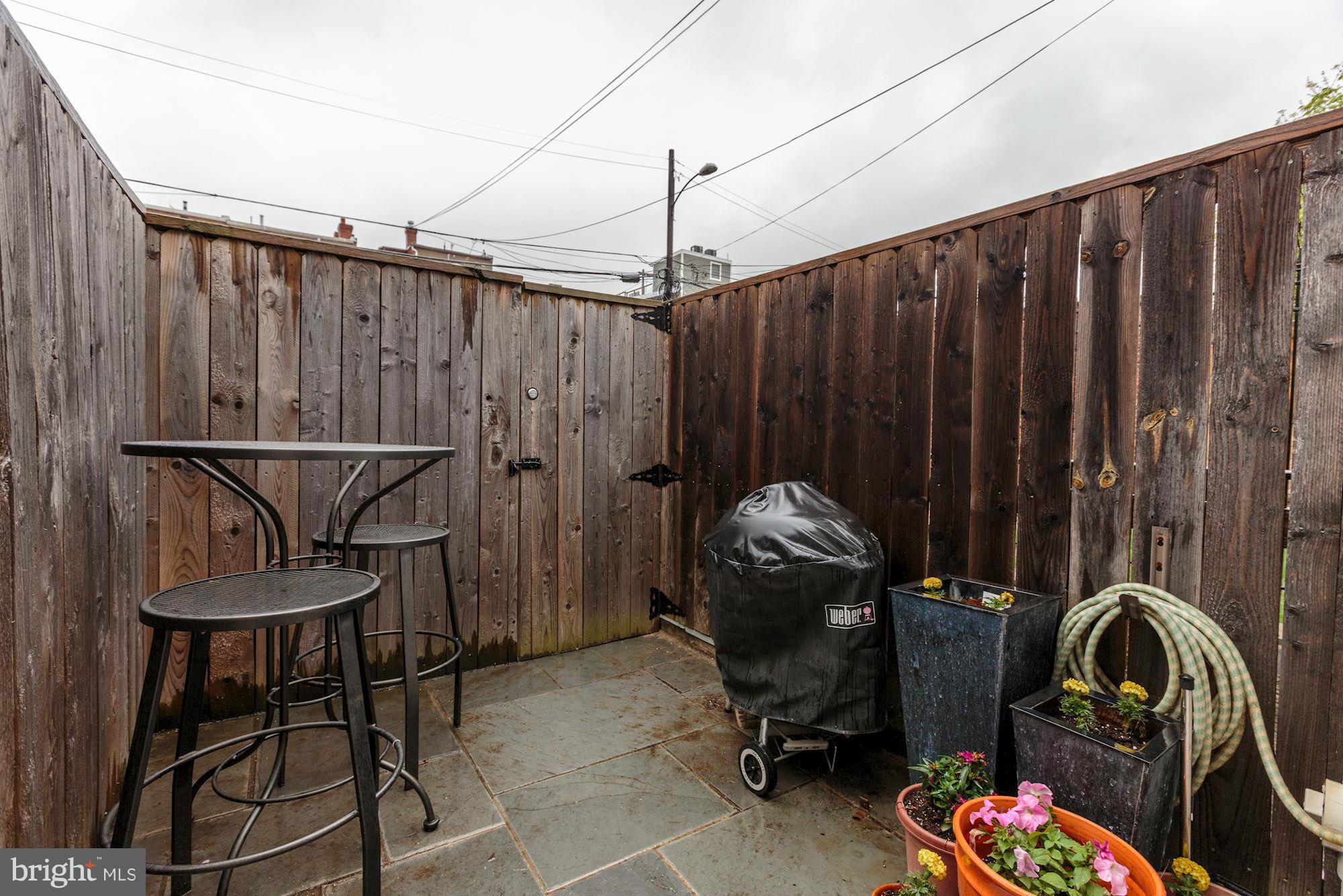 1202 Fairmont Street Northwest, Unit 2 Washington, DC 20009 - Photo 23 of 26 Private patio for dining, grilling, & gardening