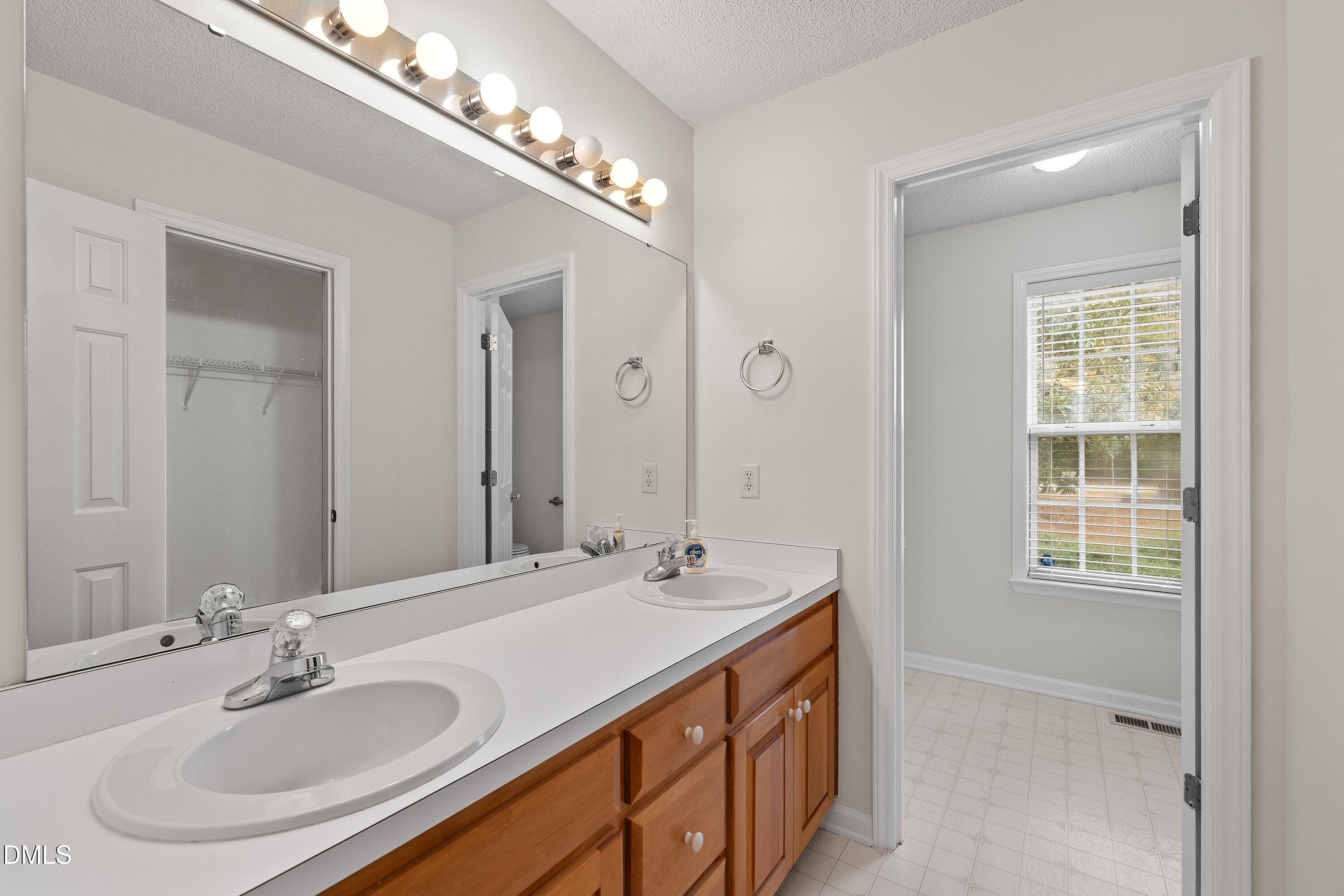 6236 Bridgemont Lane Willow Spring, NC 27592 - Photo 14 of 29 Primary bathroom sink