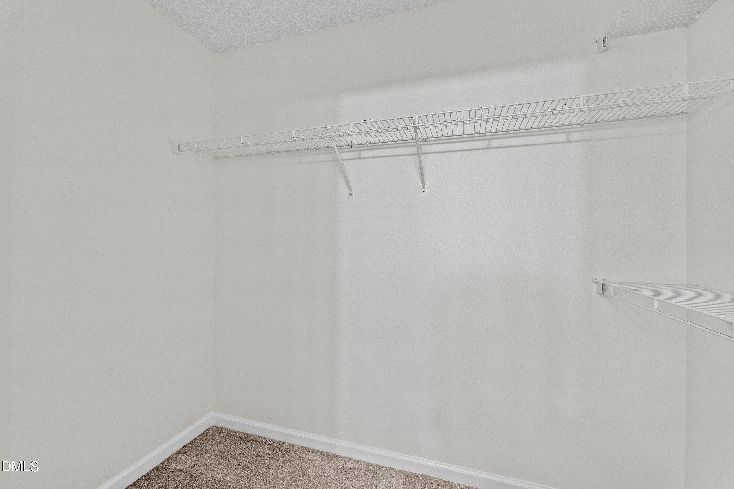 6236 Bridgemont Lane Willow Spring, NC 27592 - Photo 16 of 29 Primary bedroom closet