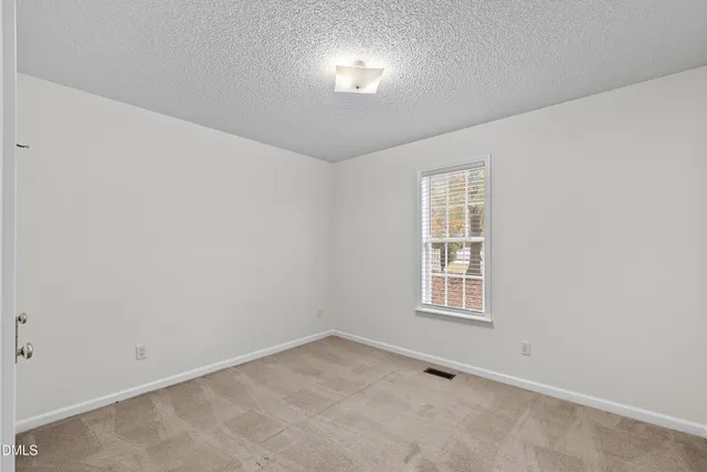 a bathroom with a window and a window