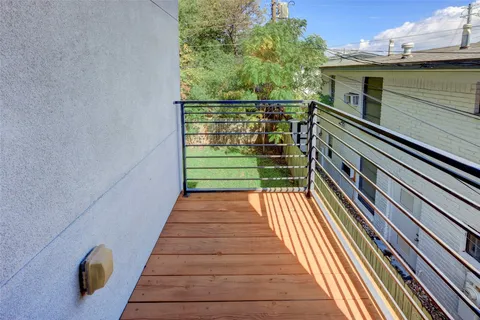 a view of a balcony with an outdoor space