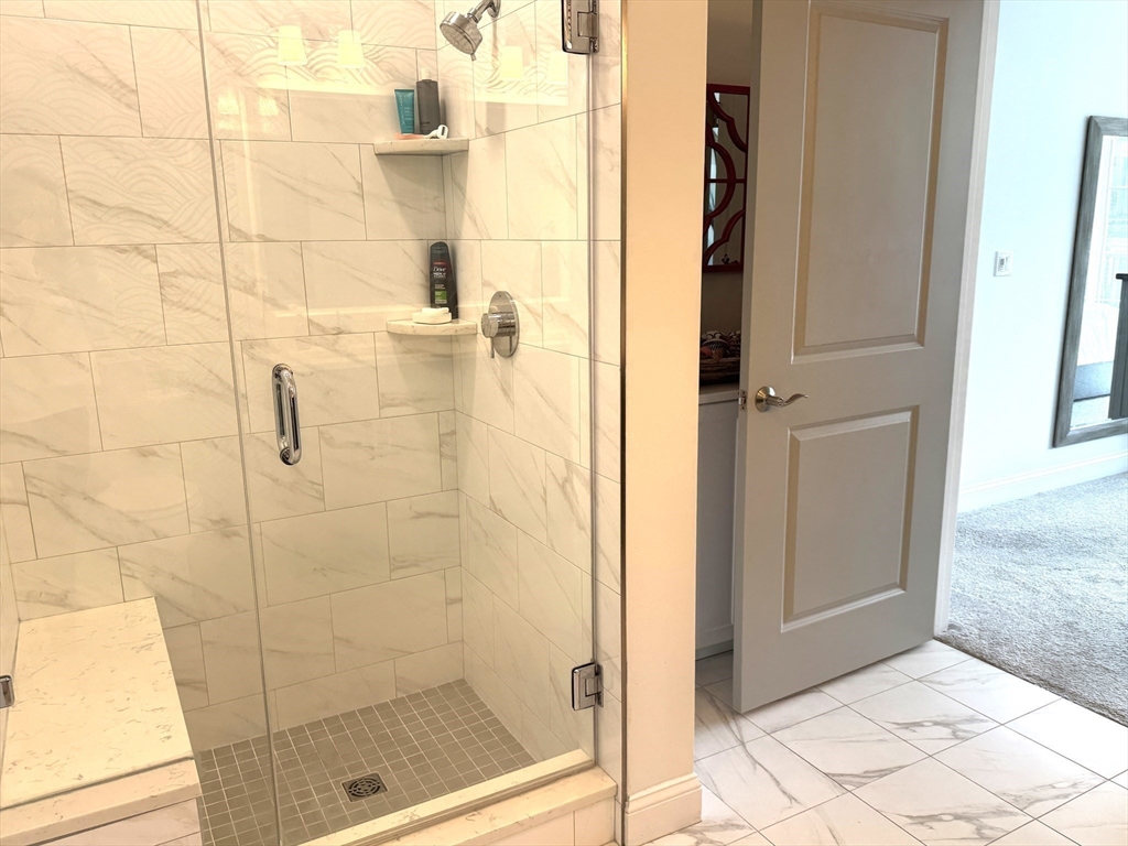 1 Revolution Way, Unit 307 Canton, MA 02021 - Photo 15 of 31 a bathroom with a shower