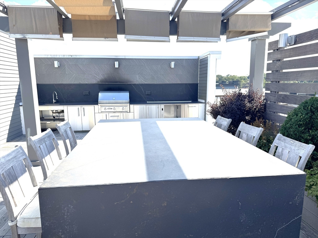 1 Revolution Way, Unit 307 Canton, MA 02021 - Photo 21 of 31 a view of outdoor space yard and patio