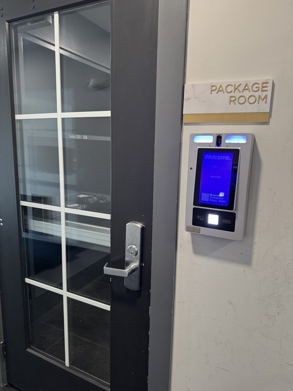 1 Revolution Way, Unit 307 Canton, MA 02021 - Photo 22 of 31 a view of a room with rack on the wall