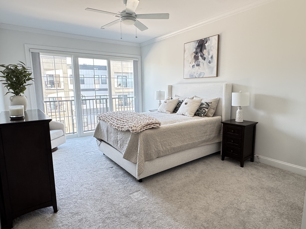 1 Revolution Way, Unit 307 Canton, MA 02021 - Photo 8 of 31 a bedroom with a bed and a window