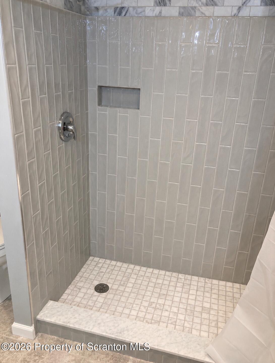 614 Warren Street Blakely, PA 18452 - Photo 33 of 44 upstairs shower with marble floor