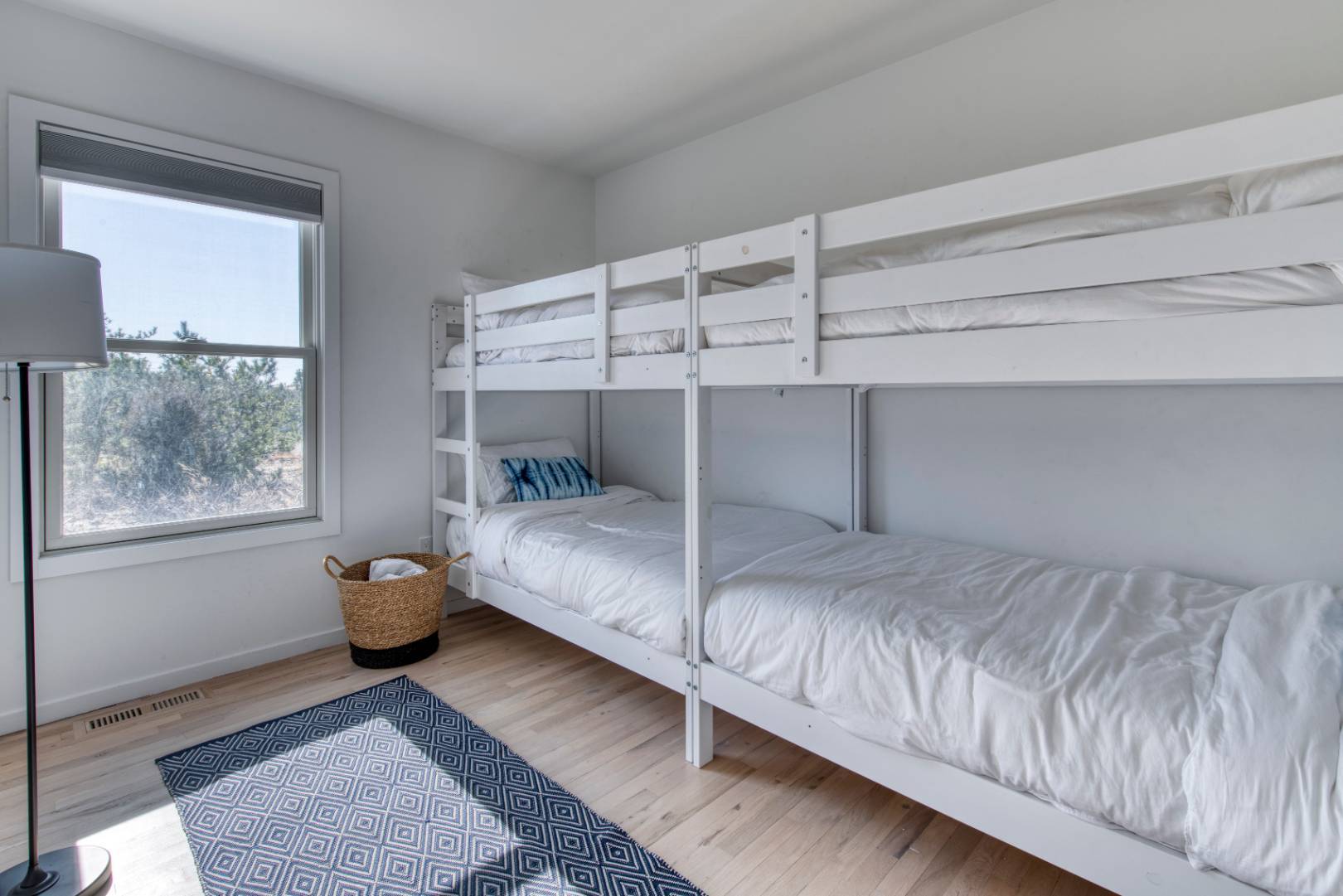 9 Marlin Drive Amagansett, NY 11930 - Photo 11 of 20 a bedroom with a bed and window