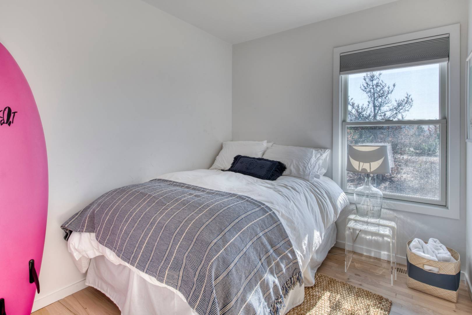9 Marlin Drive Amagansett, NY 11930 - Photo 12 of 20 a bedroom with a bed and a window