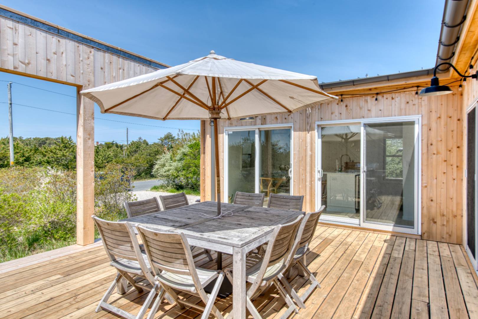 9 Marlin Drive Amagansett, NY 11930 - Photo 14 of 20 a patio with table and chairs
