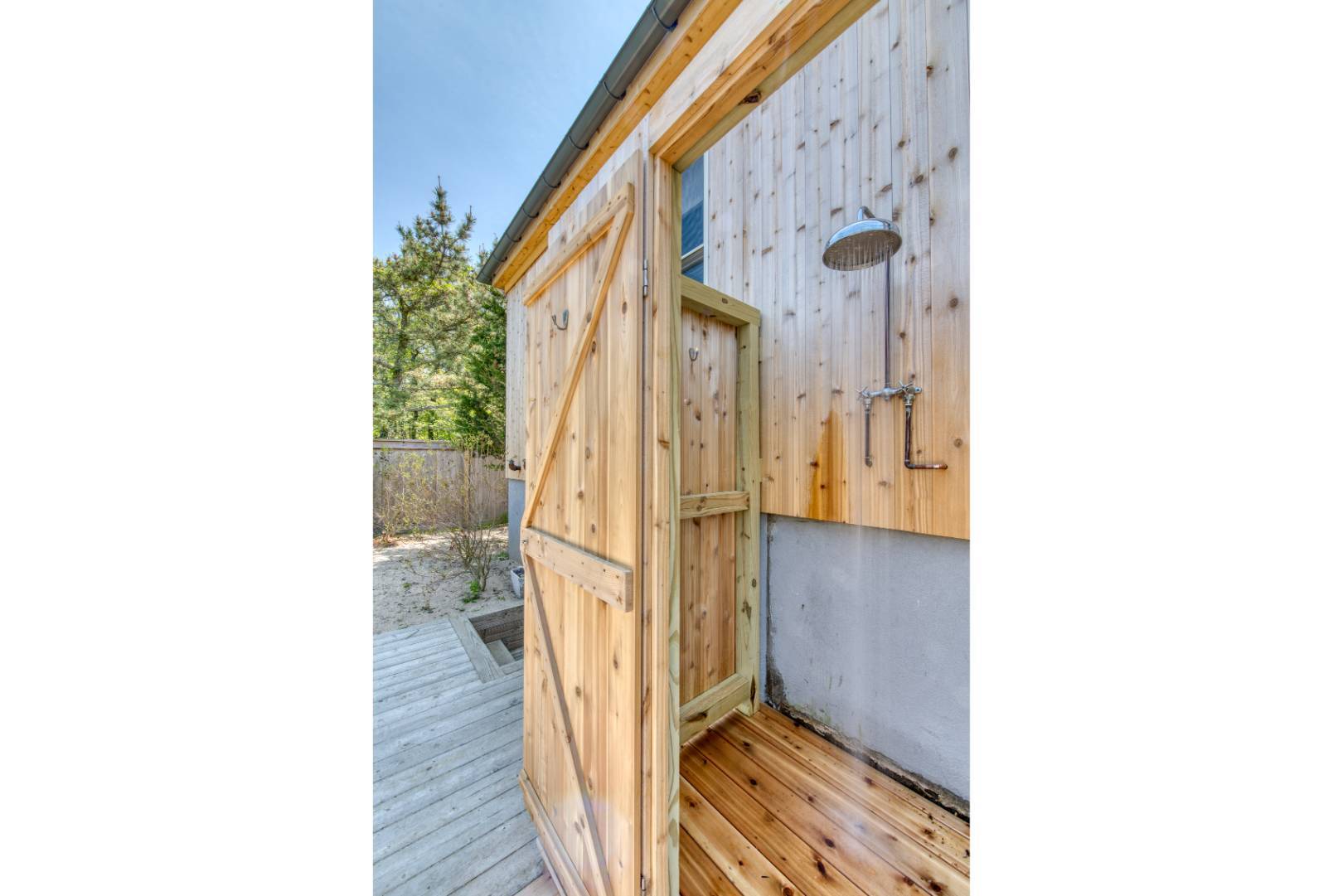 9 Marlin Drive Amagansett, NY 11930 - Photo 18 of 20 a view of a hallway with wooden floor