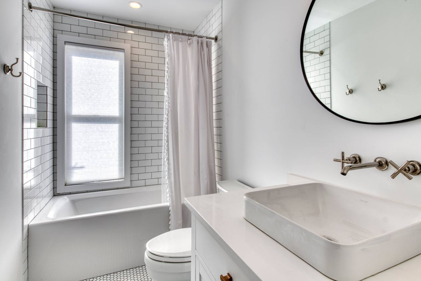 9 Marlin Drive Amagansett, NY 11930 - Photo 10 of 20 a bathroom with a sink and a mirror