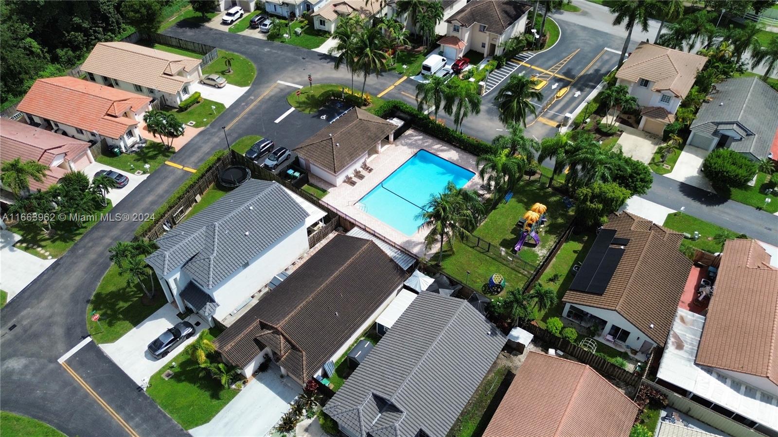 14170 Southwest 151st Avenue Miami, FL 33196 - Photo 4 of 23 an aerial view of a house with a yard