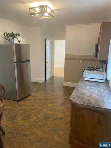 a view of a kitchen with a sink