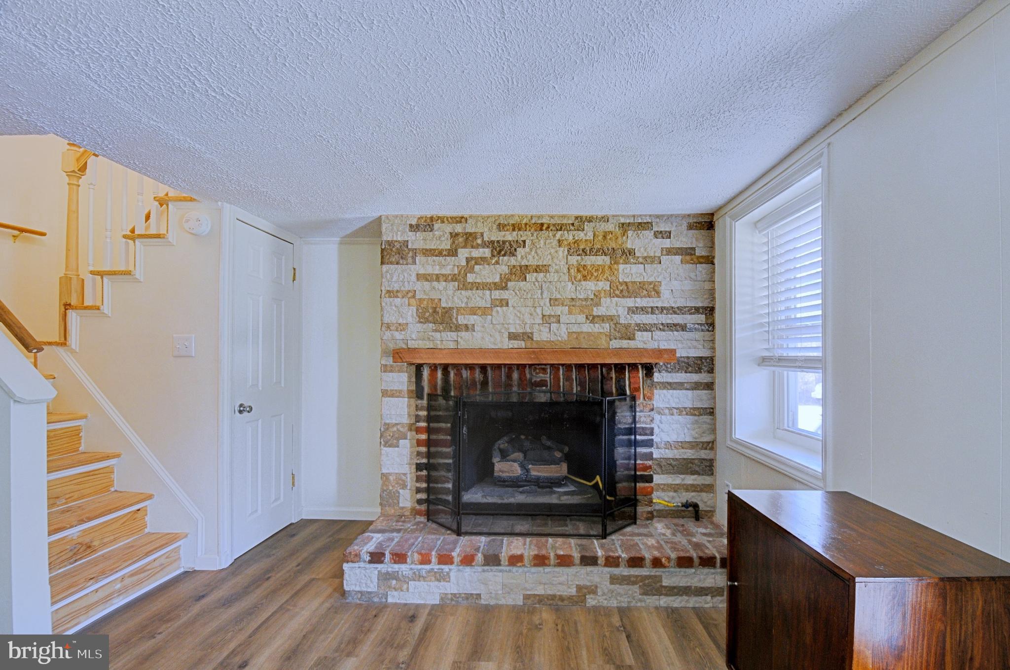 211 Ranger Court Winchester, VA 22602 - Photo 25 of 73 Stone Fireplace