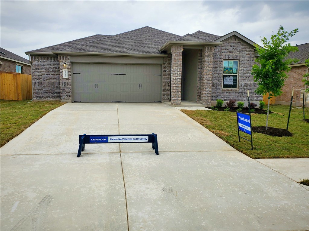 3493 Pauling Loop Round Rock, TX 78665 - Photo 1 of 19 a house view with a backyard space