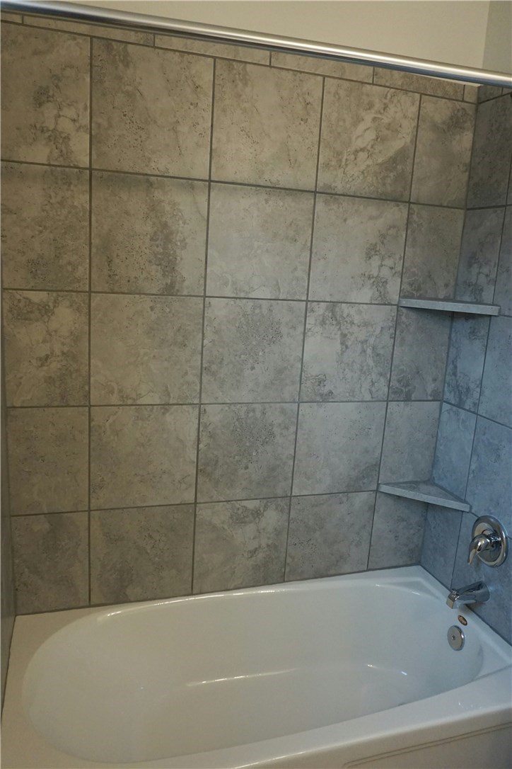 3493 Pauling Loop Round Rock, TX 78665 - Photo 16 of 19 a bathroom with a bathtub