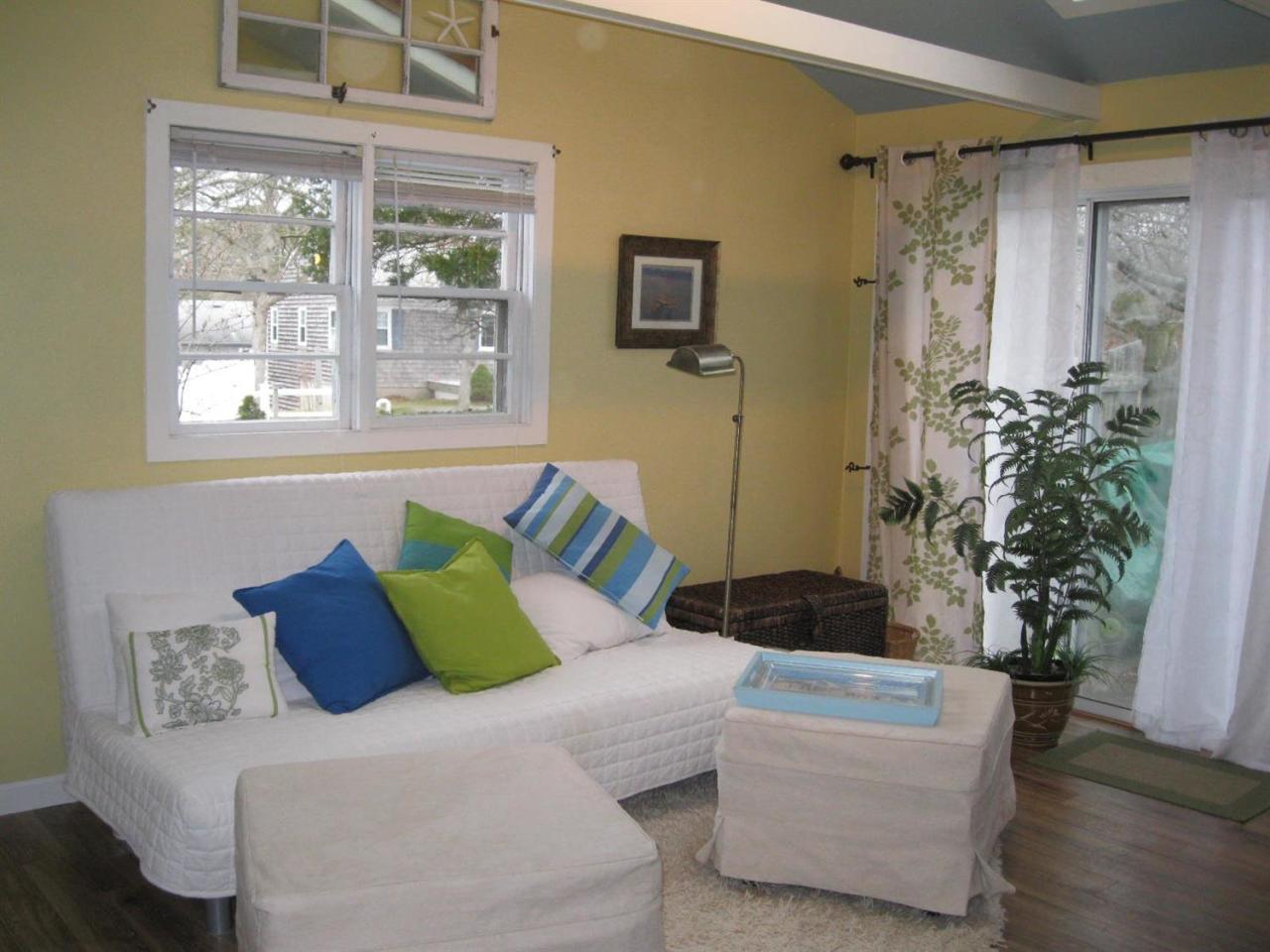 481 Lower County Road Dennis Port, MA 02639 - Photo 3 of 16 a living room with furniture and a potted plant