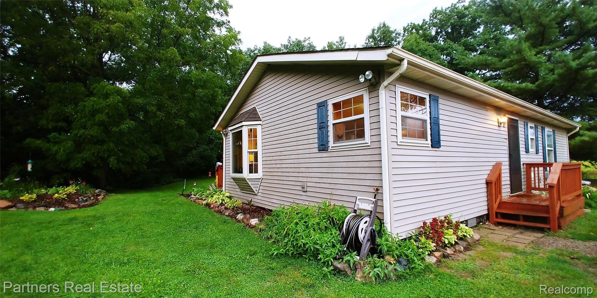 7451 Sanford Road Howell, MI 48855 - Photo 3 of 30 Well maintained and situated on a gorgeous private 2+ acres