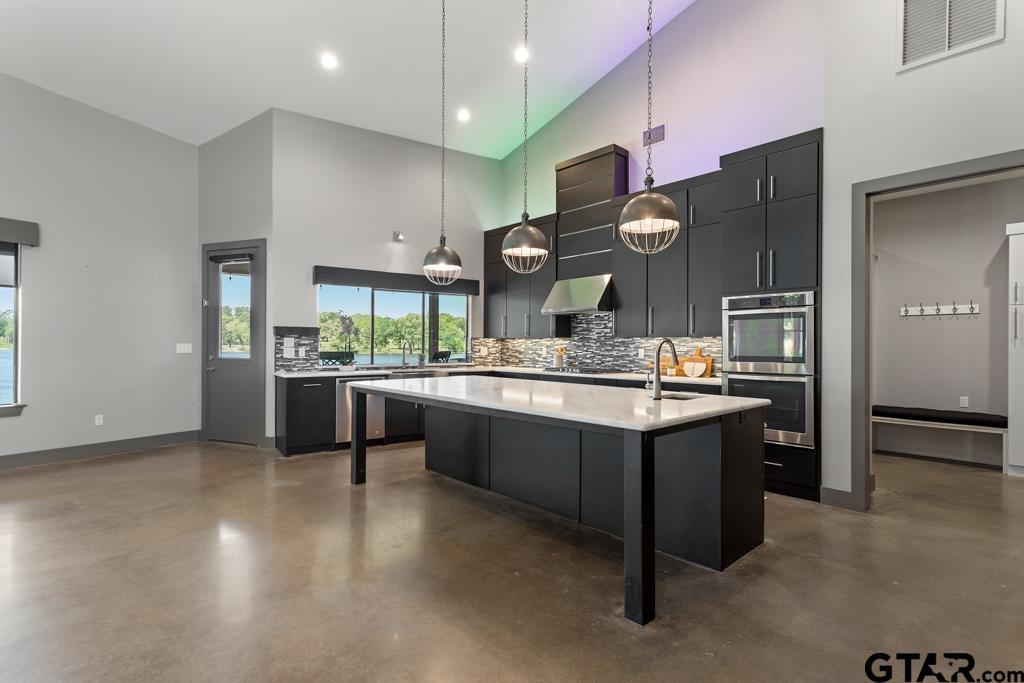 24116 Sun Ridge Road Lindale, TX 75771 - Photo 11 of 47 a kitchen with a sink and cabinets