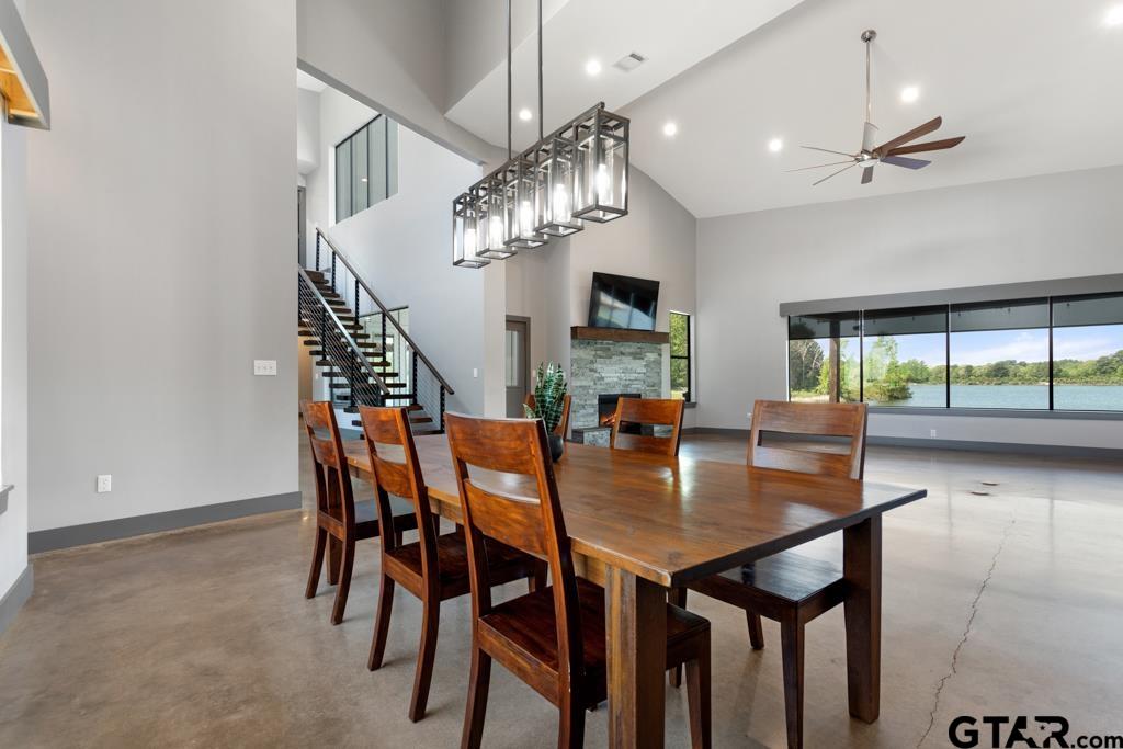 24116 Sun Ridge Road Lindale, TX 75771 - Photo 14 of 47 a view of a dining room with furniture and a chandelier