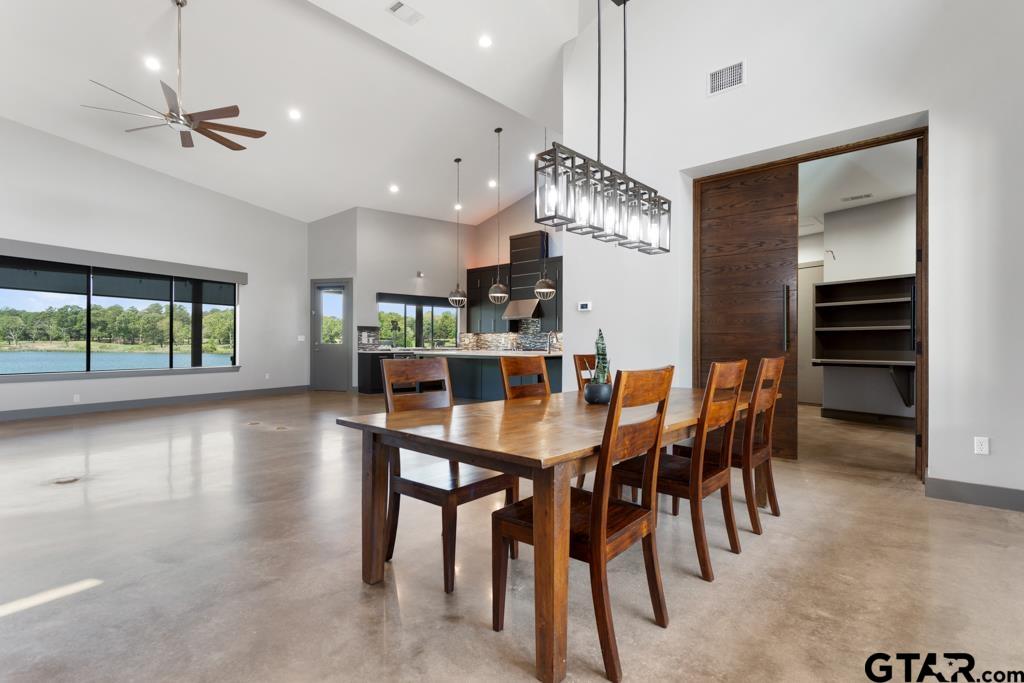 24116 Sun Ridge Road Lindale, TX 75771 - Photo 15 of 47 a dining area with furniture and window