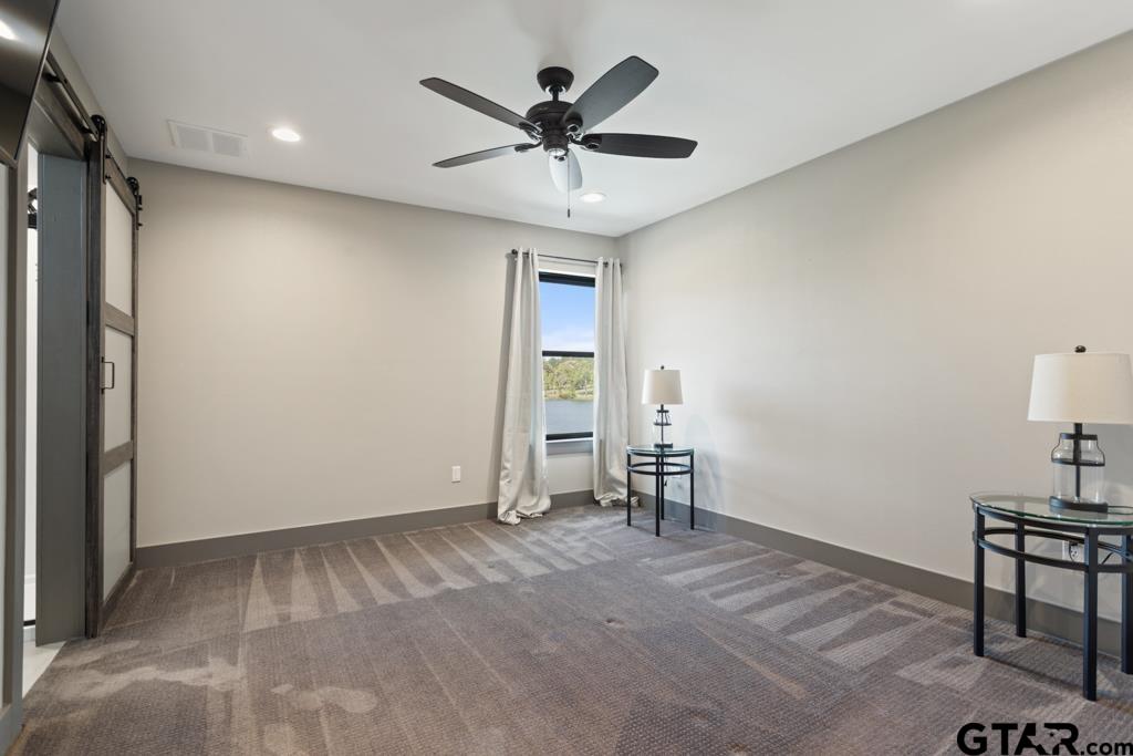 24116 Sun Ridge Road Lindale, TX 75771 - Photo 33 of 47 a view of workspace with furniture and a ceiling fan