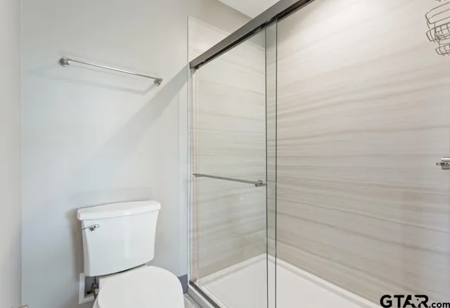 a view of swimming pool with outdoor seating and yard