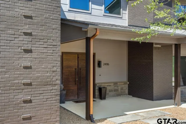 a view of swimming pool with a lounge chair