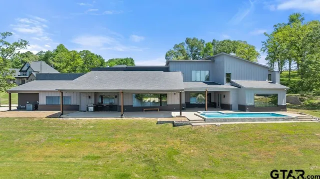 a view of a lake with houses in the back