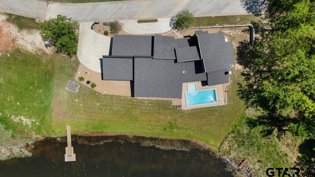 24116 Sun Ridge Road Lindale, TX 75771 - Photo 47 of 47 an aerial view of residential houses with outdoor space and trees all around