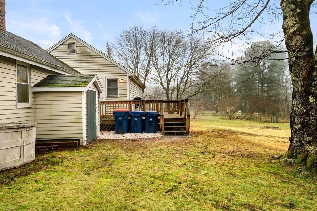 653 Walnut Plain Road Rochester, MA 02770 - Photo 23 of 30 a view of house with a yard