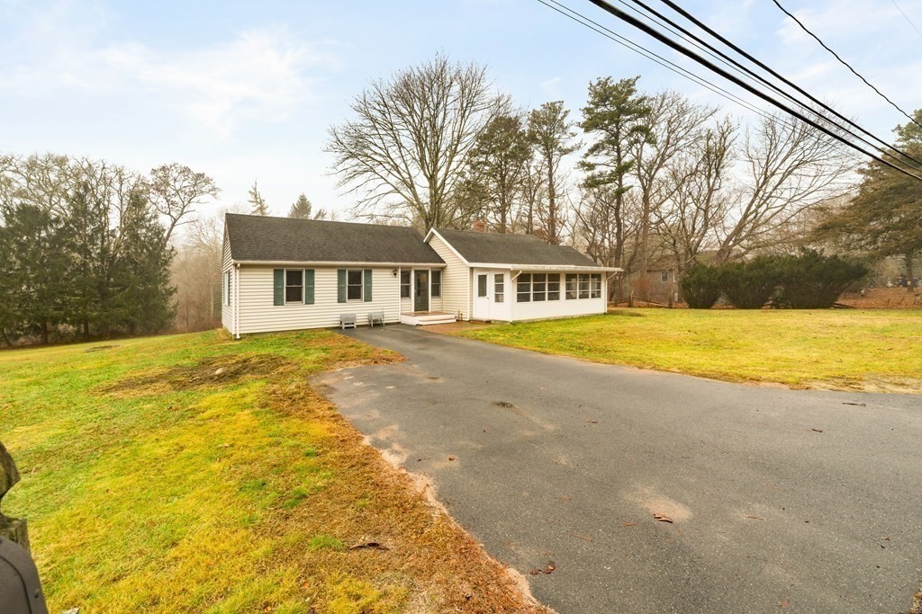 653 Walnut Plain Road Rochester, MA 02770 - Photo 3 of 30 a view of a house with swimming pool