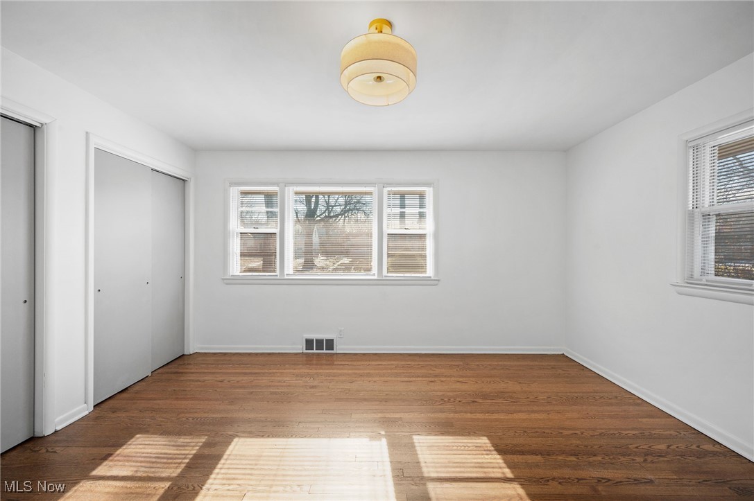 15857 Henley Road Cleveland, OH 44112 - Photo 31 of 42 Unfurnished bedroom featuring hardwood / wood-style floors